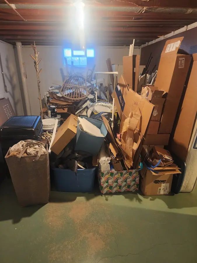 Roll-off dumpster container at job site for Yard Waste Dumpster Rental in Scarborough